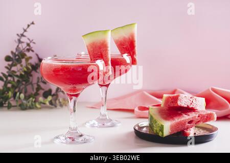 Refreshing watermelon cocktail with mint in glasses on the table Stock Photo