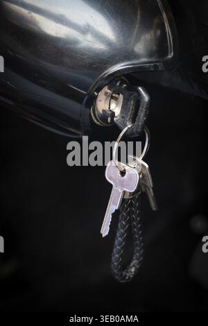 Car key stuck in ignition lock, vintage car, black Volvo Amazon, medium class car from Swedish car manufacturer Volvo, built in 1968 Stock Photo