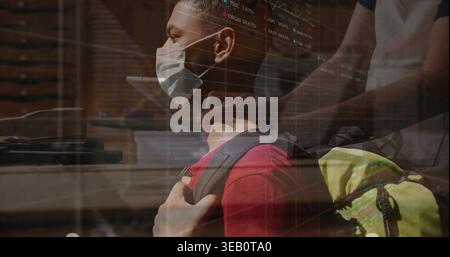 Holding shoulder strap, man wearing surgical mask in red shirt at entrance, neon backpack visible Stock Photo