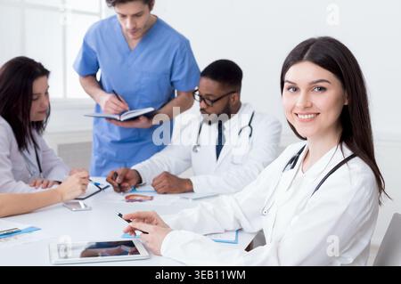 Team of doctors having meeting in medical office Stock Photo
