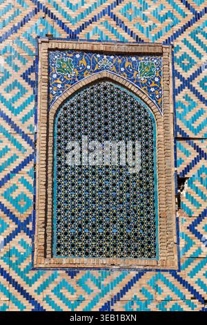 Square Mozaic Pattern Geometric tilework and lattice window detail on Sher Dor Madrasah at ...