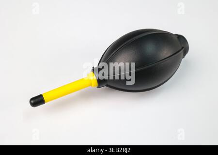 A Manual Hand Air Blower isolated on a White Background, This blower is generally used to clean dust from the DSLR or Mirrorless cameras and, Lenses. Stock Photo