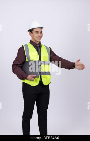 Man in construction uniform gesturing for guidance Stock Photo