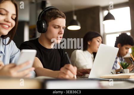 Group of students studying in university library Stock Photo
