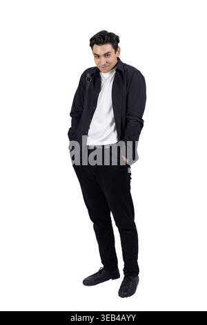 Confident young man standing and looking at camera Stock Photo
