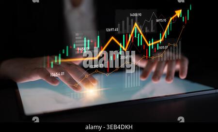 Businessman Analyzing Stock Market Data Trends on Digital Tablet with Financial Graphs and Charts Illustrating Growth and Investment Opportunities Stock Photo