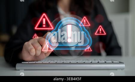 Red alert triangles over a blue cloud icon, symbolizing cloud security threats, system warnings, and data protection risks in digital environments Stock Photo