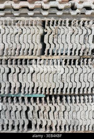 Old roof tiles arranged in rows, abstract background. Stock Photo