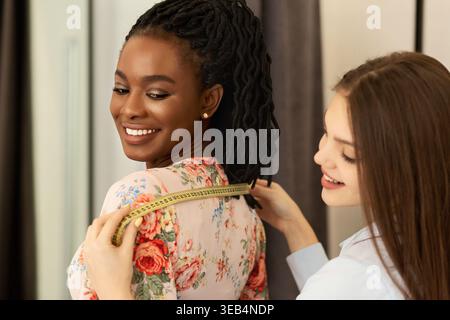 Collage of Models Being Measured for Clothing in a Fashion Studio Setting During the Day Stock Photo