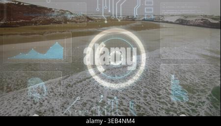 Overlaying central circular digital reticle hovering above sandy beach, with faint data panels Stock Photo
