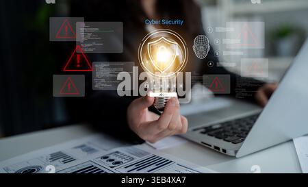 Visual representation of cyber security theme featuring a light bulb and lock, emphasizing the importance of data protection in today digital Stock Photo