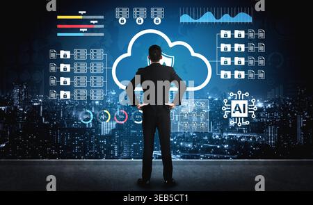 A business professional stands in front of a digital screen showcasing cloud security solutions, artificial intelligence, and data analytics Stock Photo