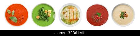 Different tasty soups in bowls isolated on white, set. Top view Stock Photo