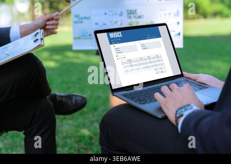 Invoice on computer screen from accounting application. Computer program for financial and budget of corporate business. brisk. Stock Photo