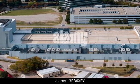 Large data center building with rooftop cooling units providing cloud compute services Stock Photo