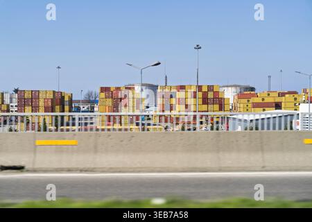 Batumi, georgia 21 april 2026: shipping containers awaiting transport at batumi, georgia port terminal. Logistics and freight transportation infrastru Stock Photo
