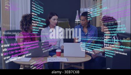 Discussing team wearing button shirts in lounge, with laptops, red-white cup and code overlay Stock Photo