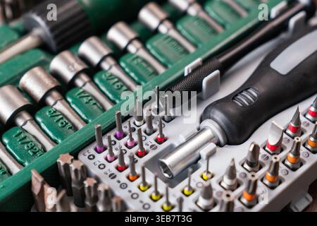 Professional Precision Screwdriver Bit Set and Socket Toolkit Close Up on White Background. High quality photo Stock Photo