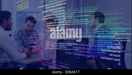 Discussing team reviewing on laptop and phone in meeting room, with code overlay and casual shirts Stock Photo