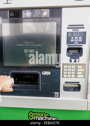 Modern digital banking interaction and secure ATM user experience. Stock Photo