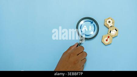 AI Business Goal and Strategy Concept with Magnifying Glass, Wooden Blocks and Target Icons. Stock Photo