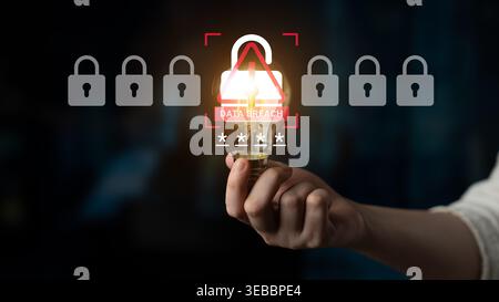 A hand holds a light bulb representing ideas in cybersecurity, emphasizing the importance of data breach prevention against potential hacking threats Stock Photo