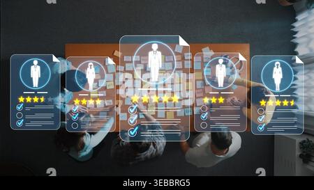 Group Of Professionals Collaborating On Project With Digital Profiles, Feedback, And Ratings Overlaid On Table Surface In Modern Office Environment Stock Photo