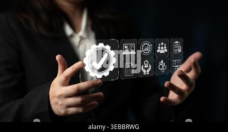Business Professional Engaging with Digital Interface Displaying Various Icons Representing Data Analytics and Management Strategy Concepts Sigmoid Stock Photo