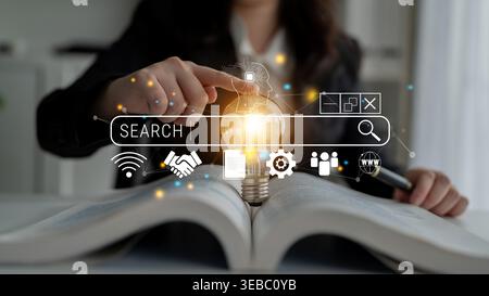 Person in Business Attire Searching for Information Using a Digital Search Bar with Light Bulb Concept in the Background Quark. Stock Photo