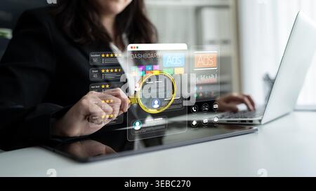 Business Professional Analyzing Analytics Dashboard on Laptop with Virtual Interactive Interface Displaying Charts and Data Metrics Sigmoid Stock Photo
