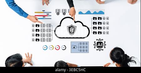 A group of professionals engages in a collaborative discussion about cloud security and data protection, analyzing visual data representations for Stock Photo