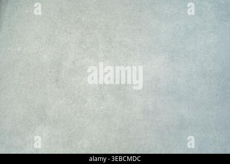 Soft gray textured background with subtle gradients. Minimal abstract surface ideal for design, presentations and copy space Stock Photo