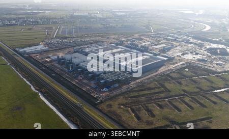 Groningen, Netherlands - 20 January 2026: Aerial view of Datacenter Westpoort featuring its large industrial structure and cooling systems surrounded Stock Photo