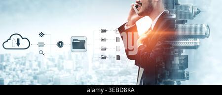 Business professional engaging in mobile communication while managing cloud data with technology icons and urban background emphasizing digital Stock Photo