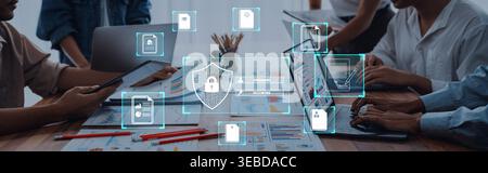 Business Team Collaborating on Digital Security Strategies with Innovative Technology and Data Visualization in Modern Office Environment Quark. Stock Photo