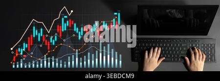 Aerial view of a person hands on a keyboard analyzing a colorful financial chart that illustrates stock market trends, showcasing data and growth Stock Photo