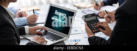 Business intelligence and data analysis concept. Analyst team working on financial data analysis dashboard on laptop screen as marketing indication Stock Photo
