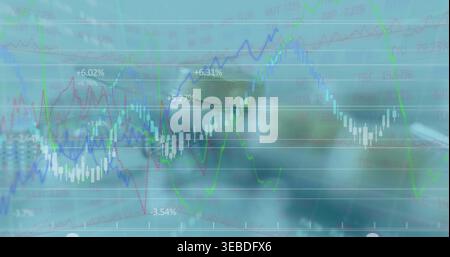 Displaying market visuals overlaying candlestick chart and colored lines on screen with eyeglasses Stock Photo