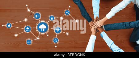 A visual representation of collaborative computing featuring diverse hands united over a network diagram with cloud elements, symbolizing teamwork and Stock Photo