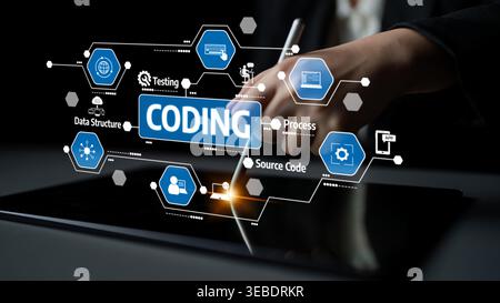 A hand holds a stylus above a tablet displaying various coding icons and symbols. This image illustrates the concepts of programming, testing, and Stock Photo