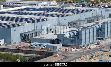 Aerial view of Datacenter Westpoort featuring solar panels on the roof and industrial cooling systems in Groningen, Groningen, Netherlands. Stock Photo