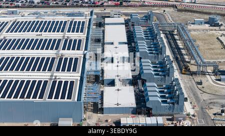 Aerial view of Datacenter Westpoort featuring solar panels on the roof, cooling systems, and industrial infrastructure in Groningen, Groningen, Nether Stock Photo