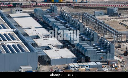 Aerial view of Datacenter Westpoort showing rows of cooling units and industrial piping at the modern facility in Groningen, Groningen, Netherlands. Stock Photo