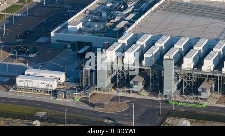 Aerial view of the Google GRQ data center facility showing industrial cooling units and large warehouse buildings in Eemshaven, Groningen, Netherlands Stock Photo