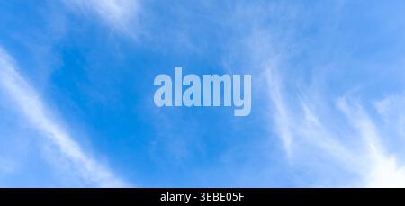 Extreme low angle view and full frame of beautiful blue sky with strange shape of fluffy white clouds in the afternoon on sunny day Stock Photo