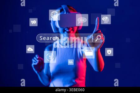 A user interacts with a virtual reality search interface, showcasing modern technology in digital marketing and user engagement for optimized online Stock Photo