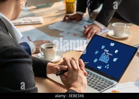 Cost reduction, cost saving concept shown on computer screen brisk, corporate business efficiently save cost and company resources by reduction of Stock Photo