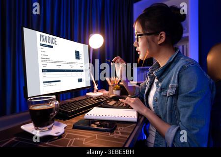Invoice on computer screen from accounting application. Computer program for financial and budget of corporate business. brisk. Stock Photo