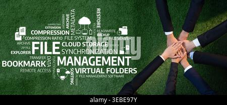 A creative visual representation of teamwork focused on file management and cloud storage, showcasing hands united over green grass, symbolizing Stock Photo