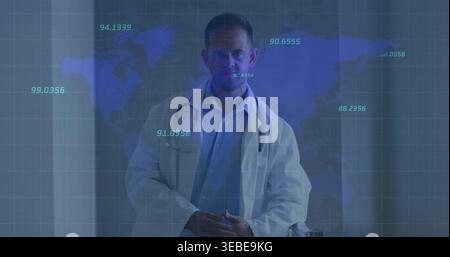 Standing physician presenting at clinic, wearing lab coat and stethoscope, showing AR map overlay Stock Photo
